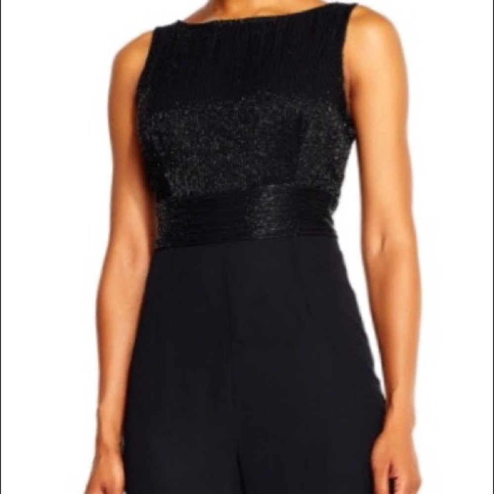 Sleeveless Jumpsuit with beaded bodice size 6 with some stretch love it !